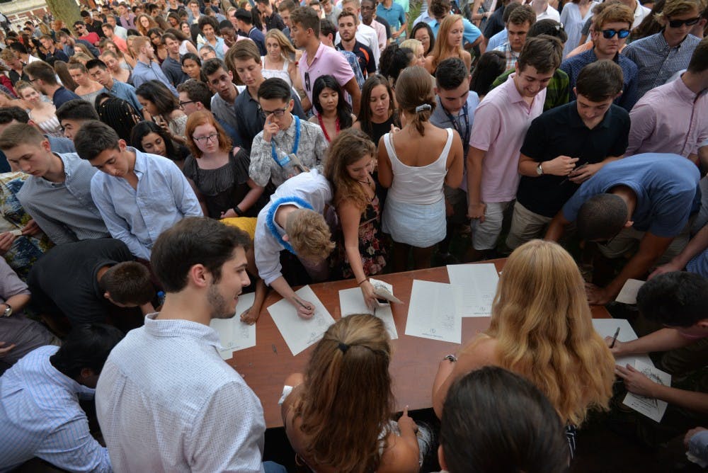 <p>Students were invited to sign the University's honor pledge following the ceremony.&nbsp;</p>