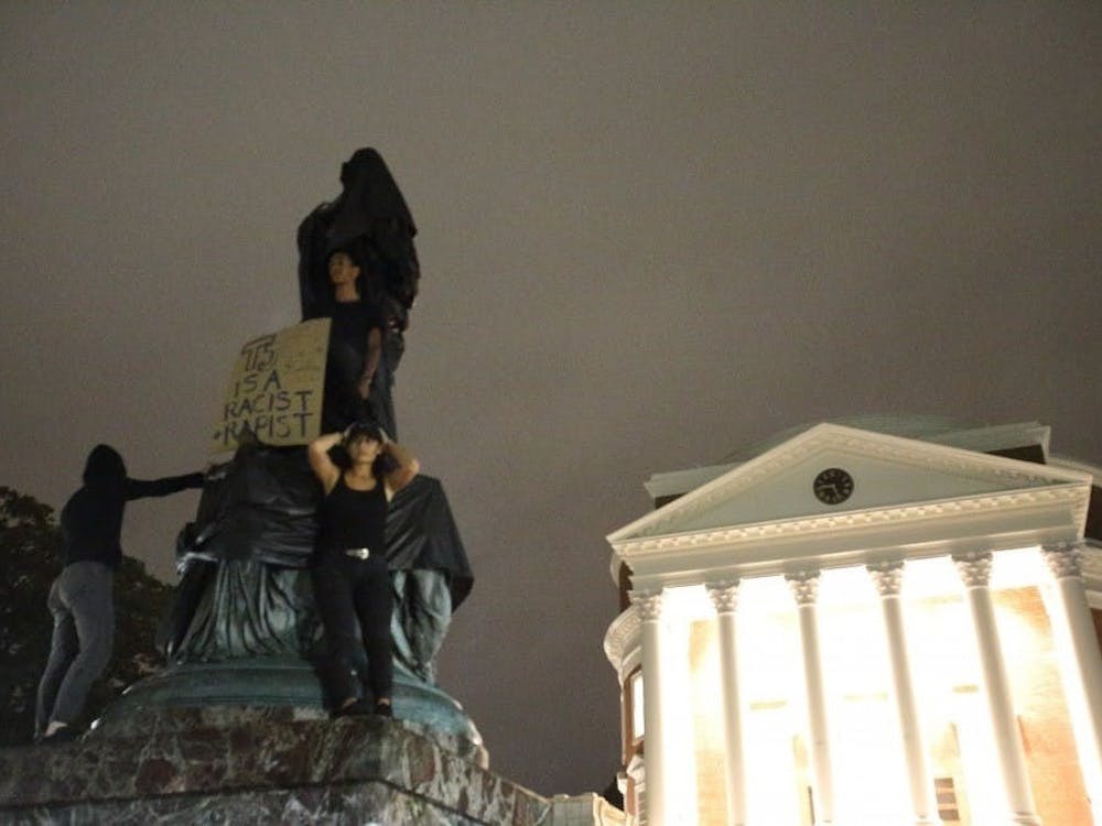 Protesters shrouded the bronze Jefferson in black fabric — a response to the Unite the Right rally of Aug. 11-12, 2017.
