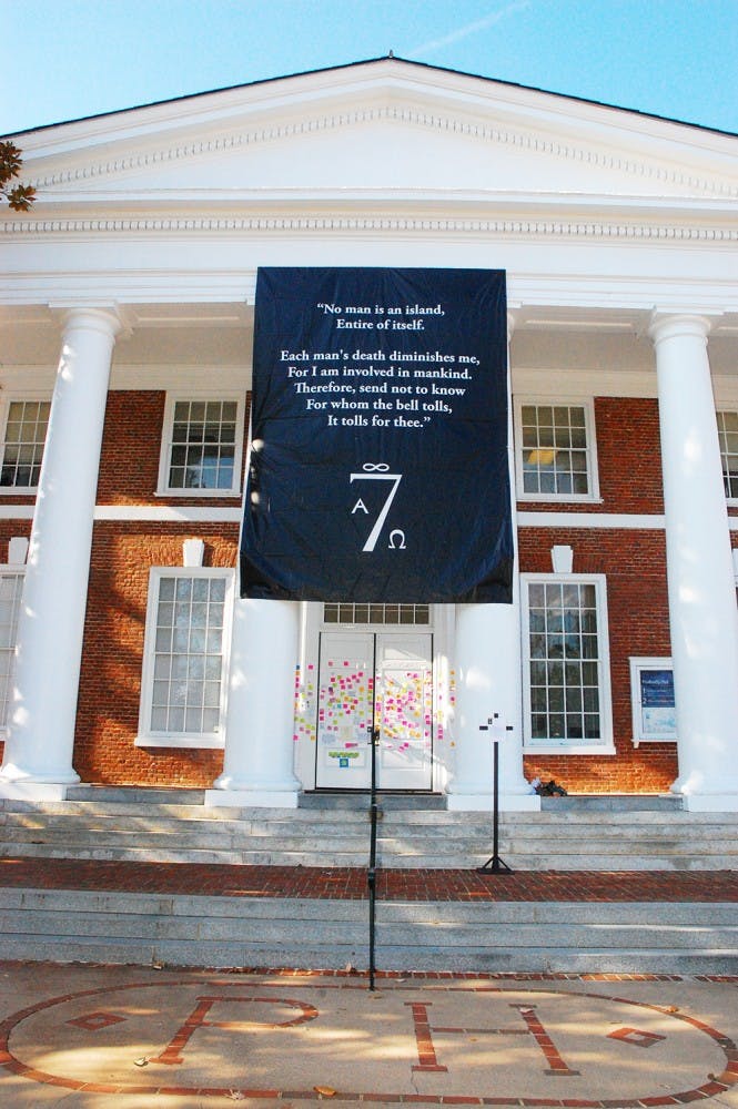 Under the banners the Seven Society placed letters soliciting proposals for their donation of $57,777.77 towards bystander intervention education.