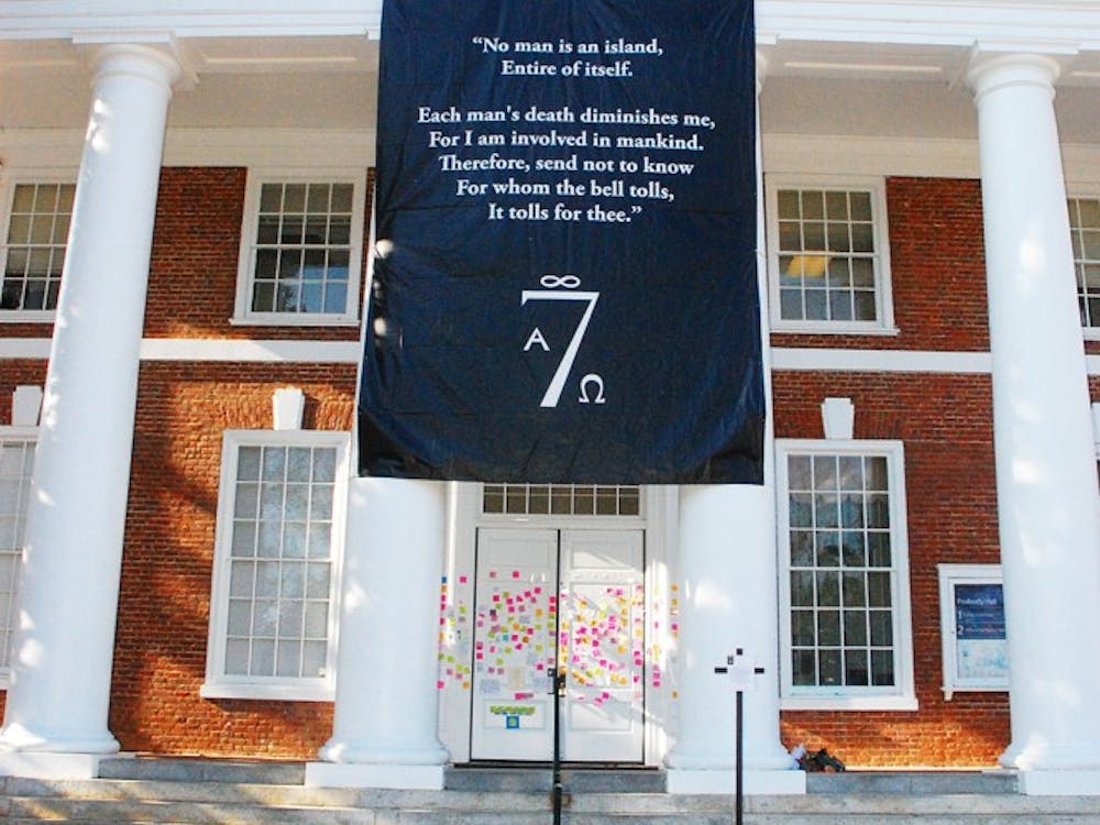 Under the banners the Seven Society placed letters soliciting proposals for their donation of $57,777.77 towards bystander intervention education.