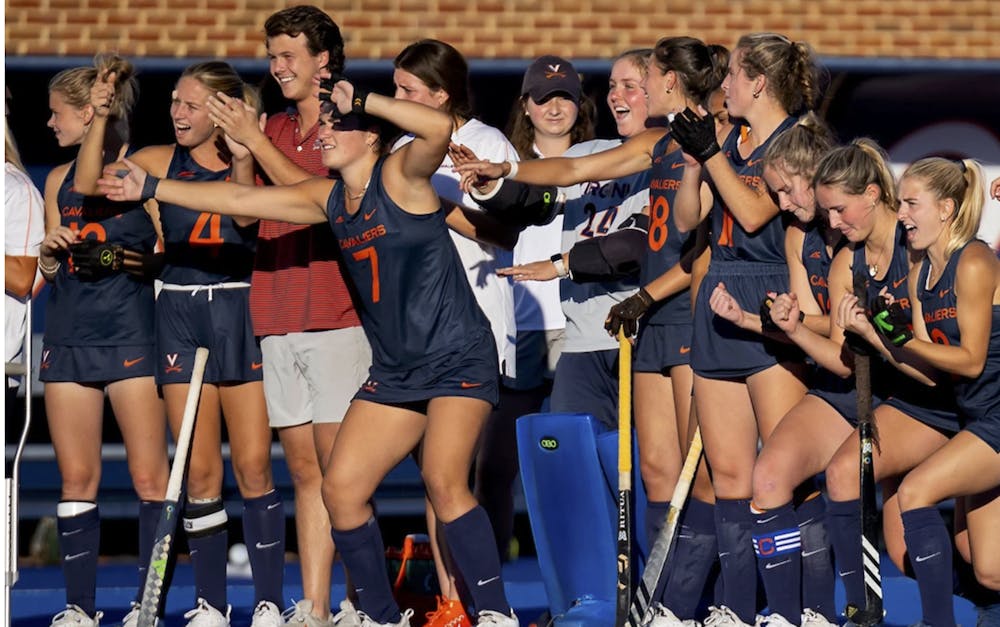 The Cavaliers celebrate a clutch goal against Syracuse Oct. 18.