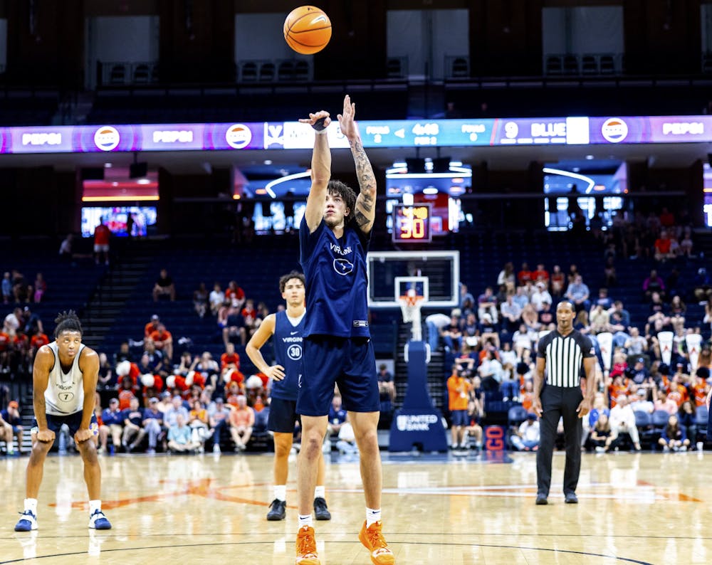 <p>Warley attempts a free throw at the Pepsi Blue-White Scrimmage Oct. 5.</p>