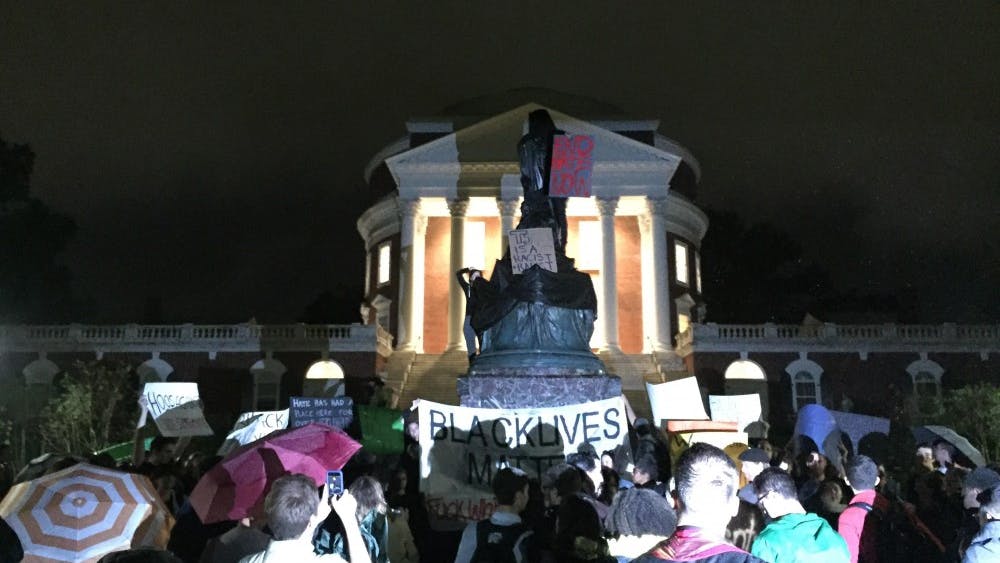 U.Va. student protesters covered the Thomas Jefferson statue in front of the Rotunda Tuesday night. 