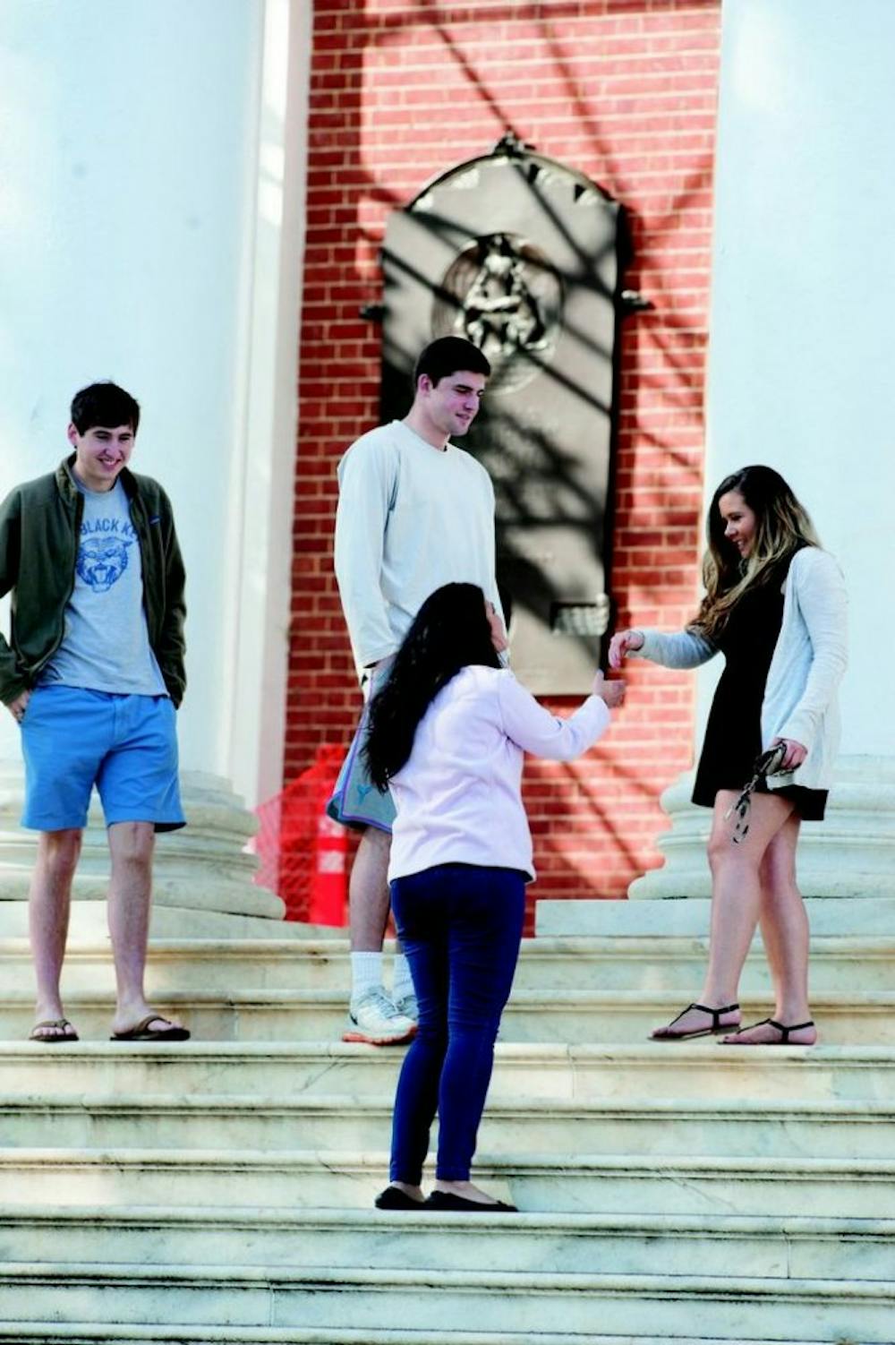 	<p>In a double-date Love Connection, junior guard Joe Harris and his friend Hart meet their dates on the steps of the Rotunda before heading to Basil for dinner.</p>