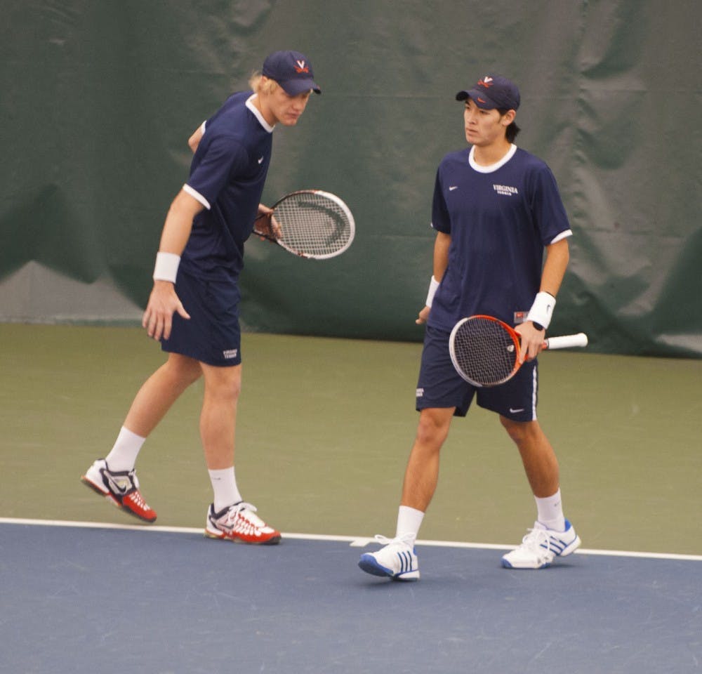 Junior Mac Styslinger (left) and sophomore Thai-Son Kwiatkowski have won seven doubles matches together this season. Kwiatkowski is also the nation's No. 1 singles player. 