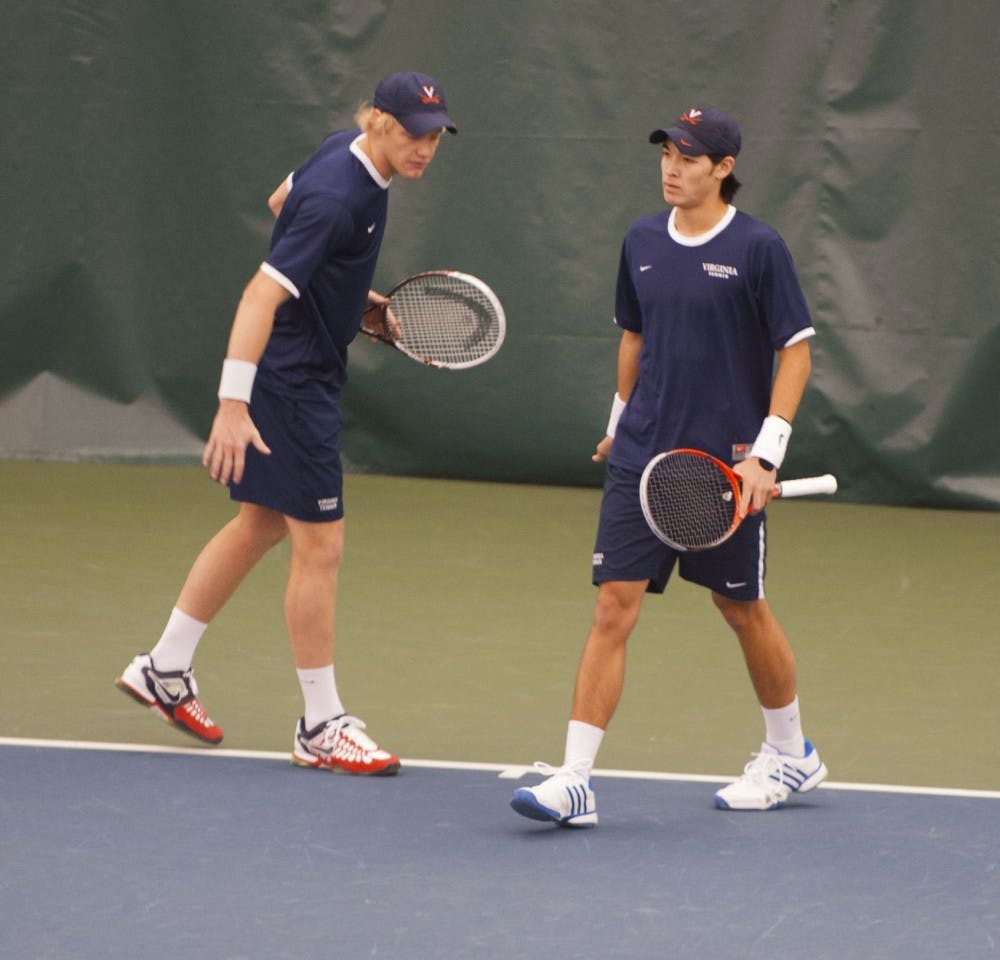 <p>Junior Mac Styslinger (left) and sophomore Thai-Son Kwiatkowski have won seven doubles matches together this season. Kwiatkowski is also the nation's No. 1 singles player. </p>