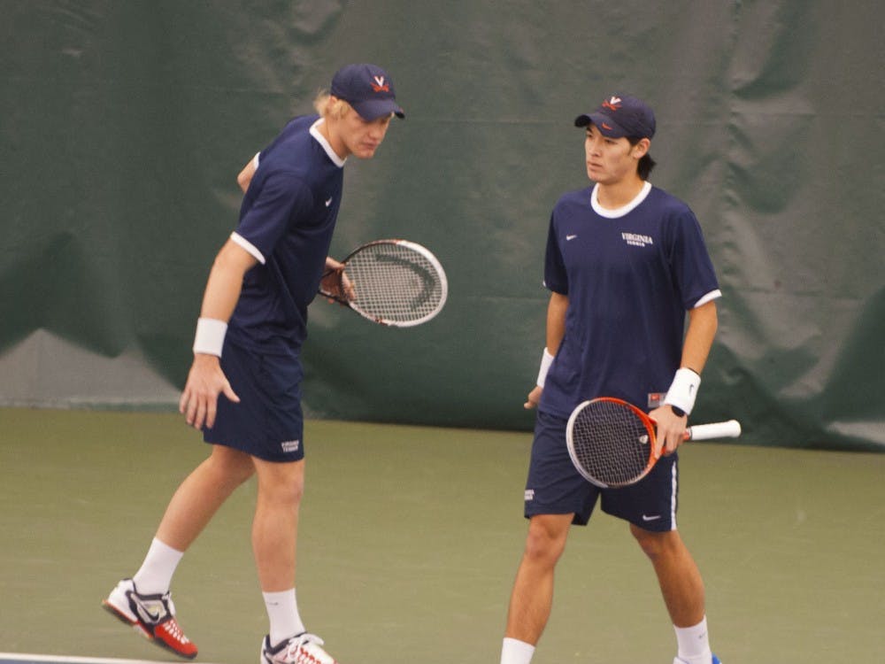 Junior Mac Styslinger (left) and sophomore Thai-Son Kwiatkowski have won seven doubles matches together this season. Kwiatkowski is also the nation's No. 1 singles player.