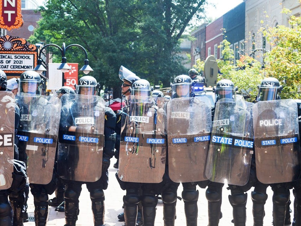 Police form a defensive line on the Downtown Mall during last August's Unite the Right rally.&nbsp;