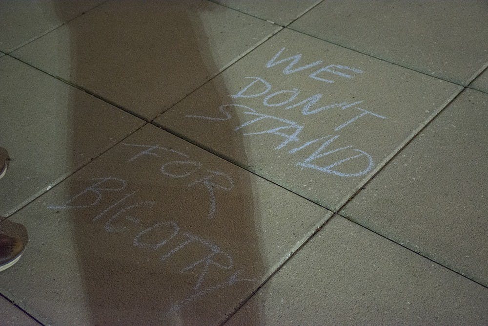 <p>QSU responded to the original chalkings with messages such as "We don't stand for bigotry" and "Love is love."</p>