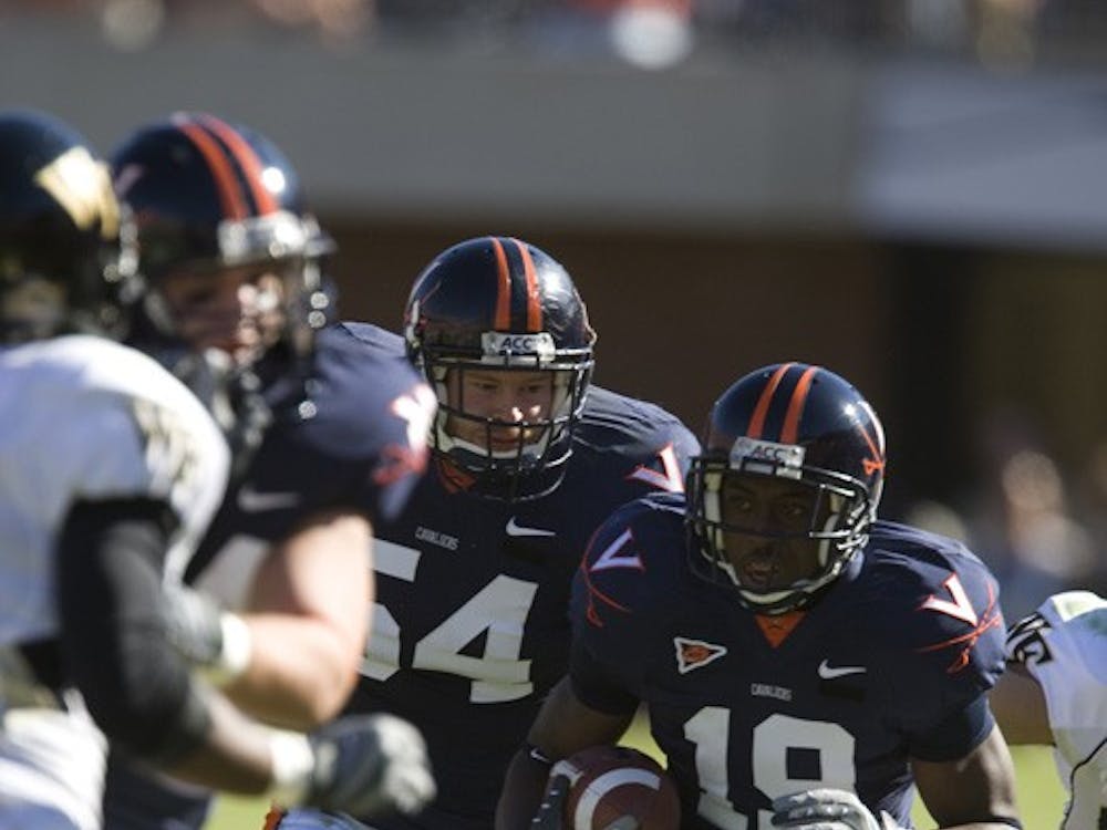 Virginia wide receiver Ras-I Dowling (19) returns an interception. The #23 Virginia Cavaliers defeated the #24 Wake Forest Demon Deacons 17-16 at Scott Stadium in Charlottesville, VA on November 3, 2007.