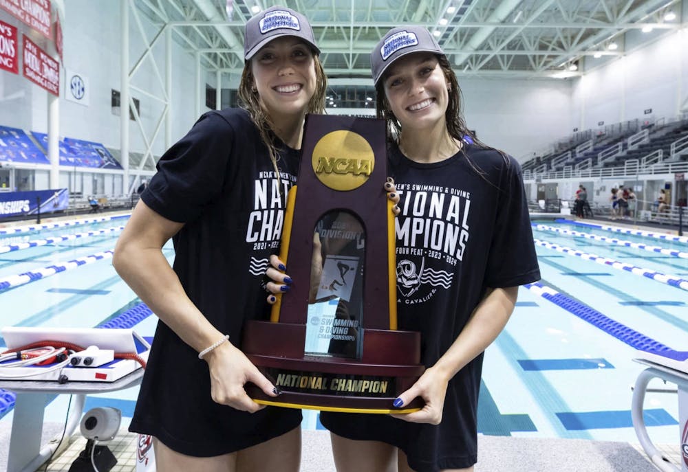 The Walsh sisters celebrate Virginia's 2024 national championship.