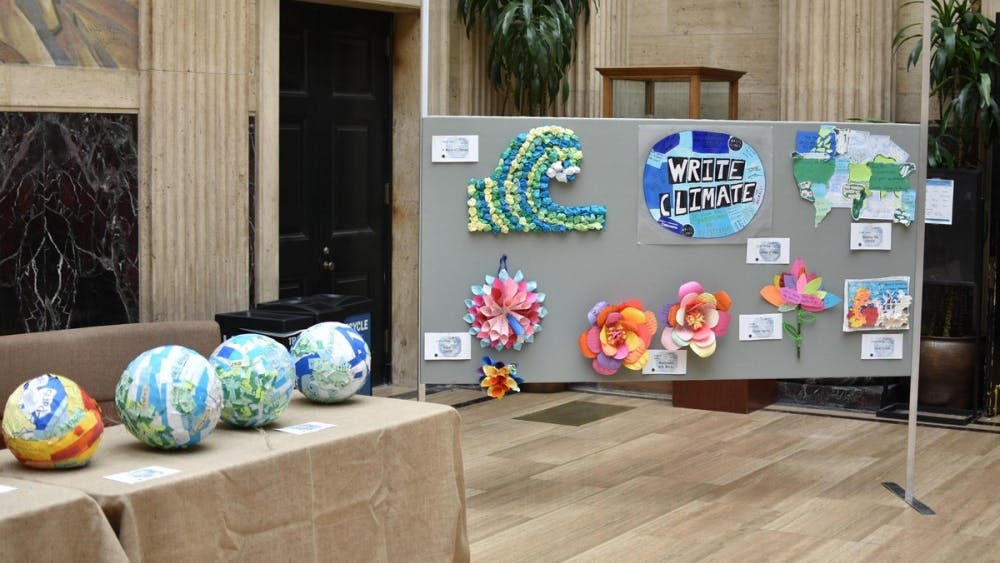 In total, the class received responses from about 1,200 people. The paper responses were then turned into art at the discretion of the students in the class.