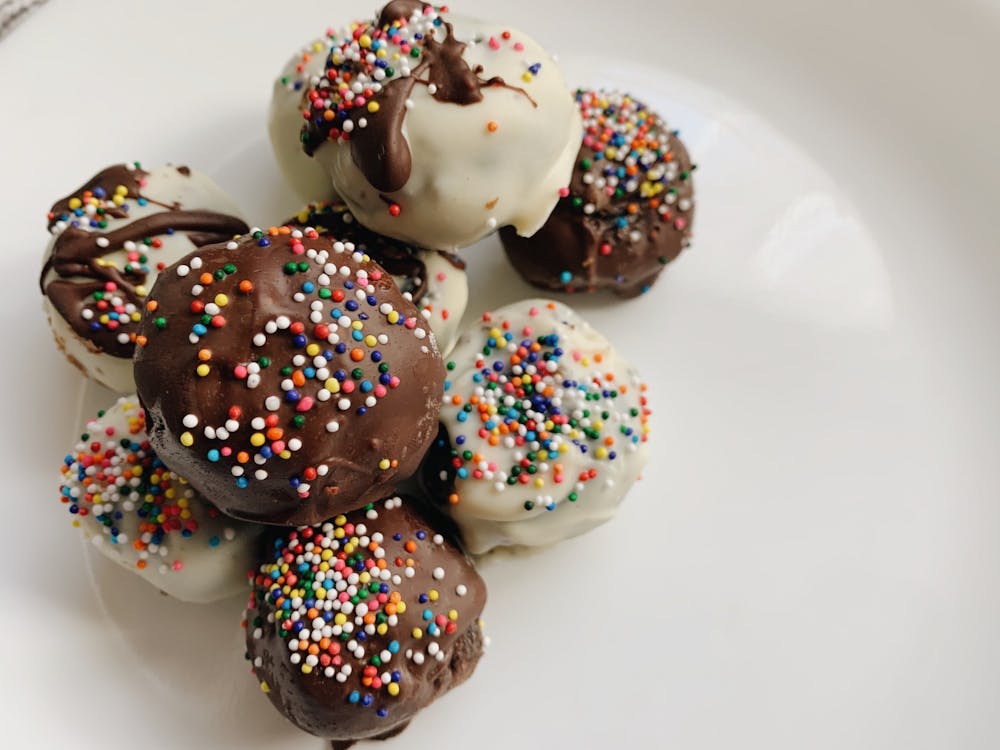 <p>To make mine visually appealing, I melted some semi-sweet chocolate from the second box and incorporated different styles in the form of drizzling and coating.</p>