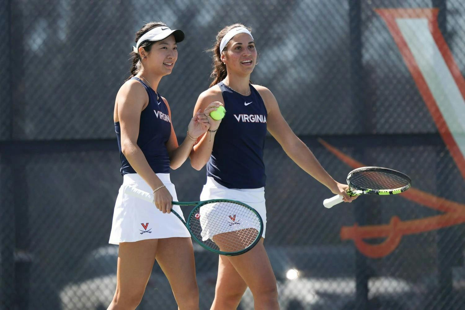 Annabelle Xu and Martina Genis Salas during a match as doubles partners.
