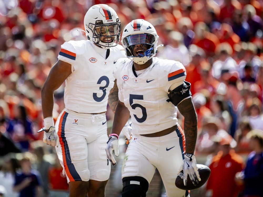 Corey Thomas Jr. and Kam Robinson celebrate an interception at Clemson Oct. 19.