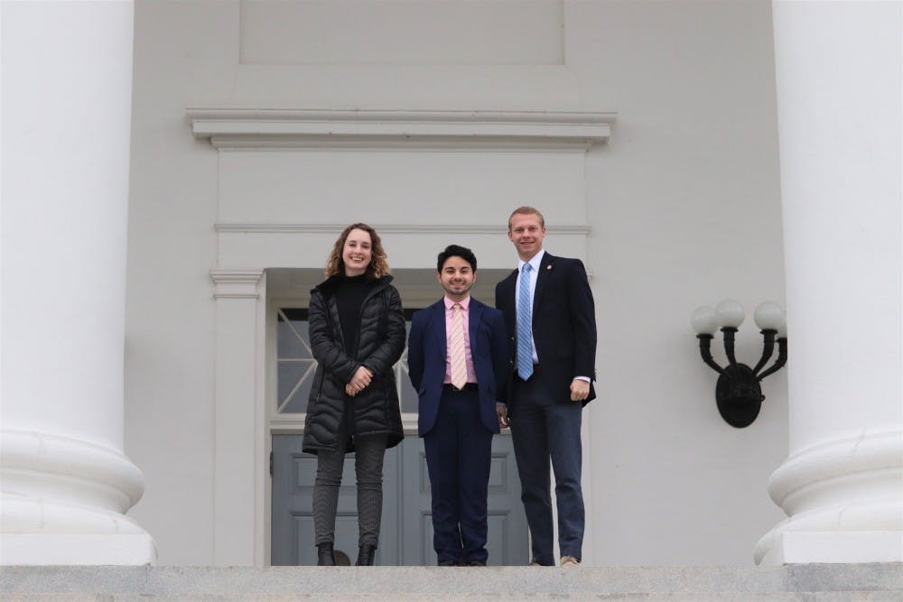 <p>Student Council members Holli Foster, a second-year College student and vice chair of legislative affairs (left); Alex Cintron, a fourth-year College student and Student Council president (center); and Isaac Weintz, a third-year College student and chair of Student Council’s legislative affairs committee (right), pose for a picture on the steps of the Capitol building in Richmond.&nbsp;</p>