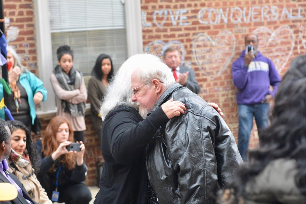 Heather Heyer's parents, Susan Bro and Mark Heyer, hugging as Bro got up to speak.&nbsp;