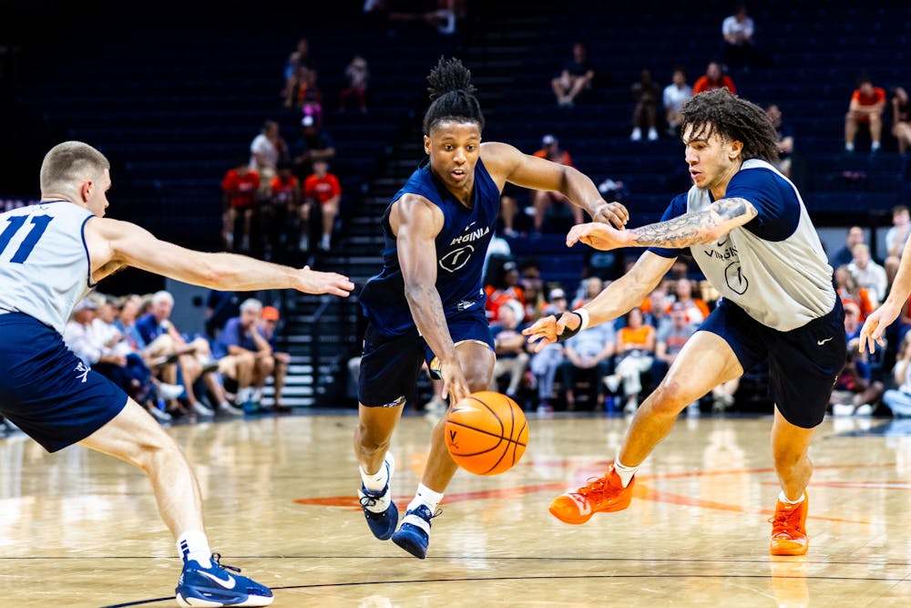 <p>Ames drives into the paint during the Pepsi Blue-White Scrimmage Oct. 5.</p>