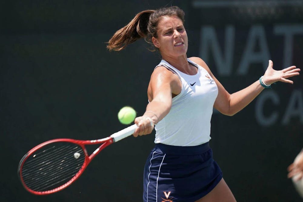 <p>Navarro rips a forehand during the title match.</p>