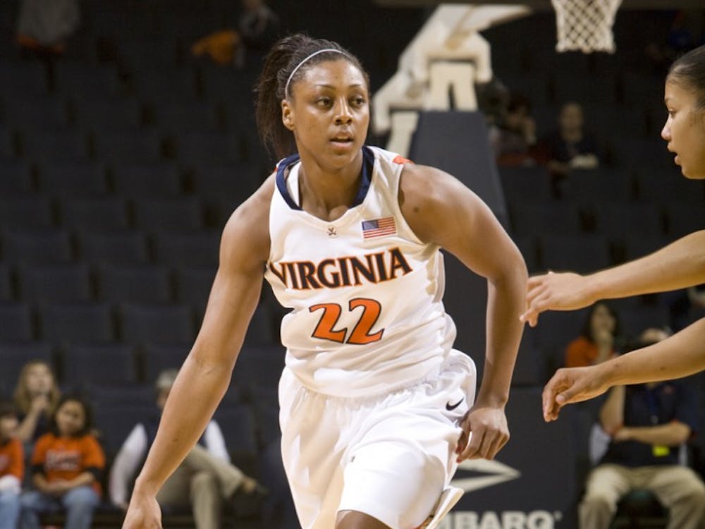 Virginia forward Monica Wright (22) in action against MU.  The Virginia Cavaliers women's basketball team defeated the Monmouth Hawks 71-45 at the John Paul Jones Arena in Charlottesville, VA on December 18, 2008.