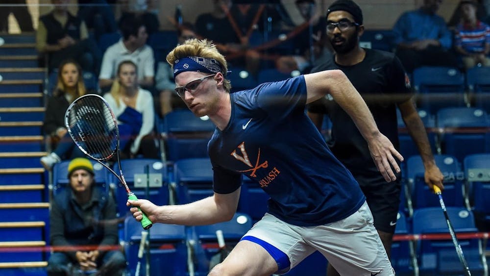 <p>Sophomore Patrick McElroy fought out a tough win in position four.</p>