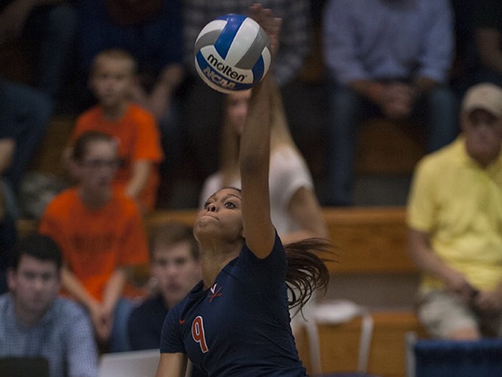Junior outside hitter Jasmine Burton tallied nine kills on a .350 attack percentage Saturday against Louisville, but the Cavaliers took their first home loss of the season.