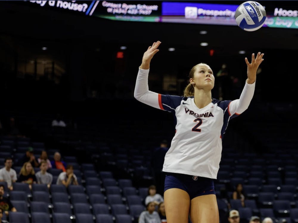 Reagan Ennist winds up a serve during a match last week at John Paul Jones Arena.