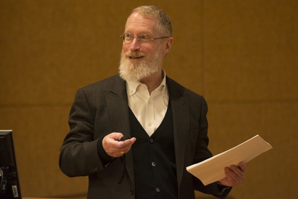 Aric Lasher, of HBRA Architects, speaks about Alderman Library renovations to faculty at an open forum.