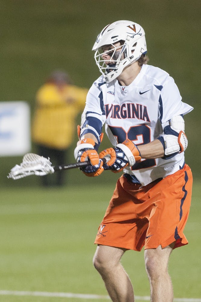 Freshman midfielder Dox Aitken looks to guide Virginia's offense against a strong Notre Dame team.