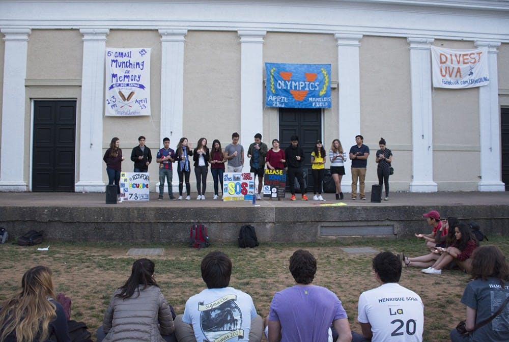 <p>Hoos for Ecuador held a vigil and lit candles after sunset&nbsp;in the Amphitheatre Sunday to remember victims of the recent earthquake in Ecuador.</p>