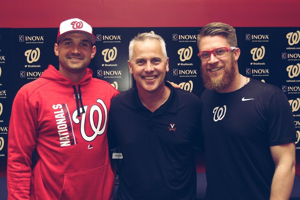<p>Former Virginia baseball players infielder Ryan Zimmerman and pitcher Sean Doolittle are pictured here with Virginia Coach Brian O'Connor.</p>