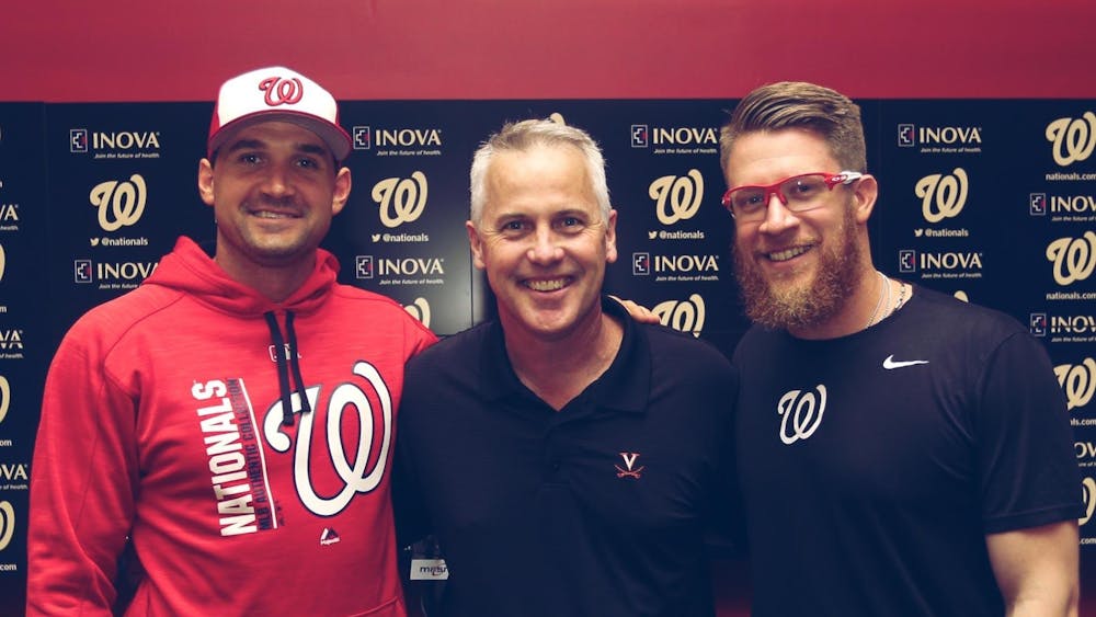 Former Virginia baseball players infielder Ryan Zimmerman and pitcher Sean Doolittle are pictured here with Virginia Coach Brian O'Connor.