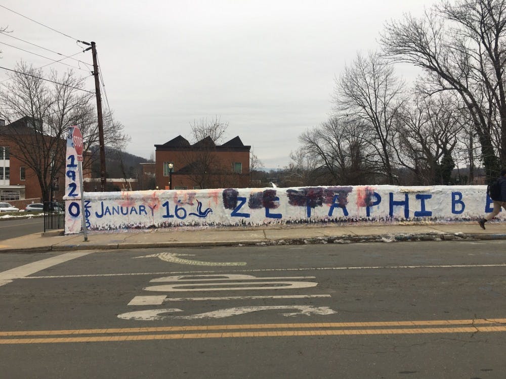 <p>The graffiti was smeared and illegible hours after the defacement.</p>