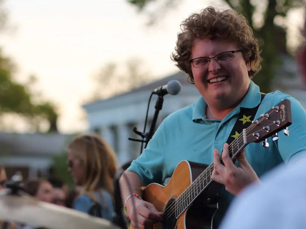 Louis Smith, U.Va. 2016 graduate and one of the founding members of Kendall Street Company, on the guitar