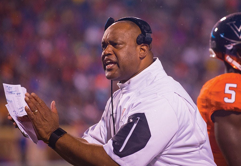 Coach Mike London and the Cavaliers suffered a 56-14 defeat against Boise State Friday night at Scott Stadium.