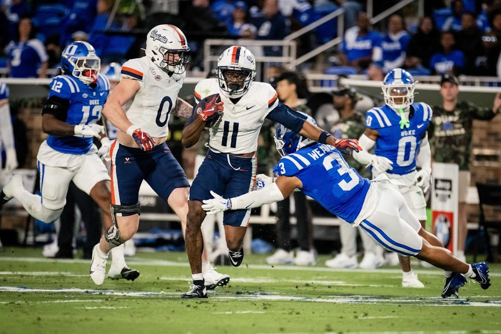 Trell Harris sprints through the Blue Devil defense.