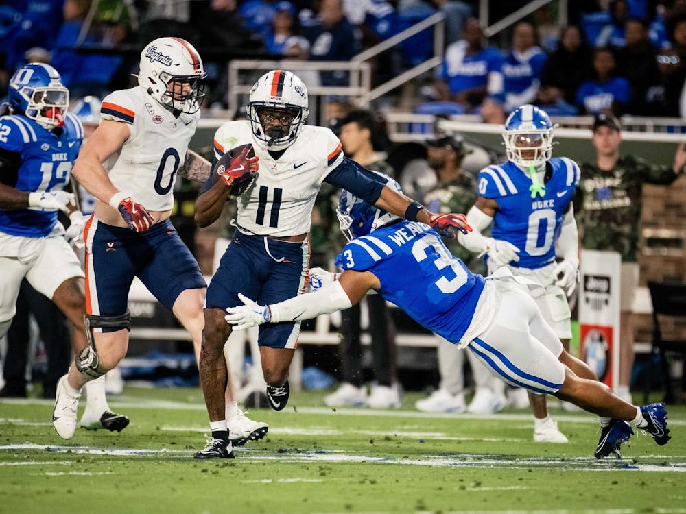 Trell Harris sprints through the Blue Devil defense.