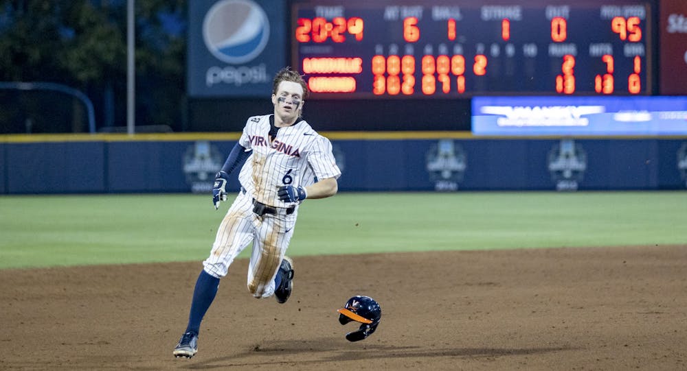 <p>Griff O'Ferrall sprints for an extra-base hit against Louisville.</p>