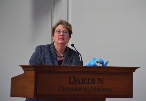 	University President Teresa Sullivan, above, addressing the faculty at the Darden School.