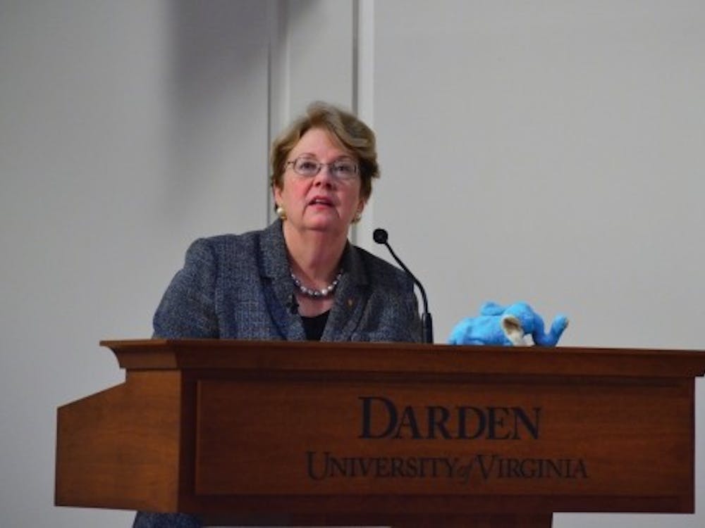 	University President Teresa Sullivan, above, addressing the faculty at the Darden School.