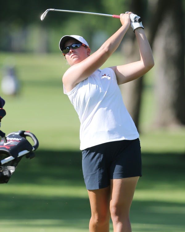 Senior Lauren Coughlin set the new low score for Virginia with an 11-under 205 for the tournament, a title she took from former teammate Briana Mao.