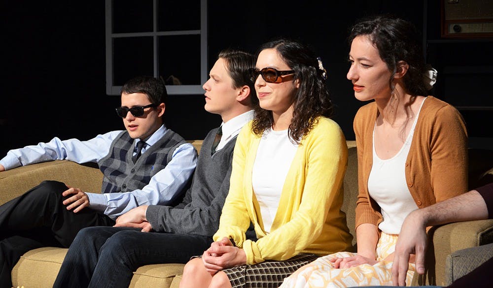 Cast members from last weekend's performance of "En la Oscuridad" acted blind onstage to great effect.
