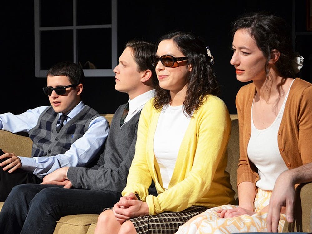 Cast members from last weekend's performance of "En la Oscuridad" acted blind onstage to great effect.