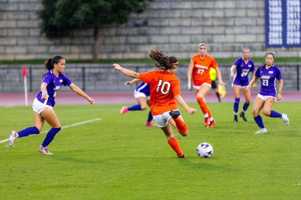 <p>Junior forward Maggie Cagle winds up for a shot against James Madison.</p>