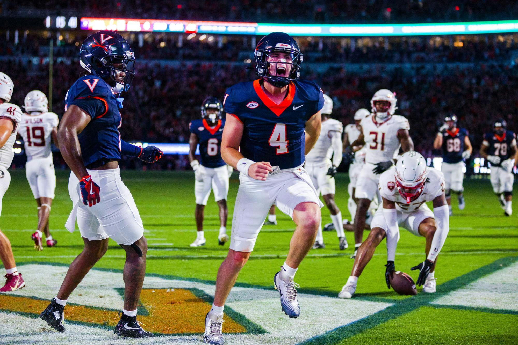 Chandler Morris darts into the endzone for one of his three rushing touchdowns.