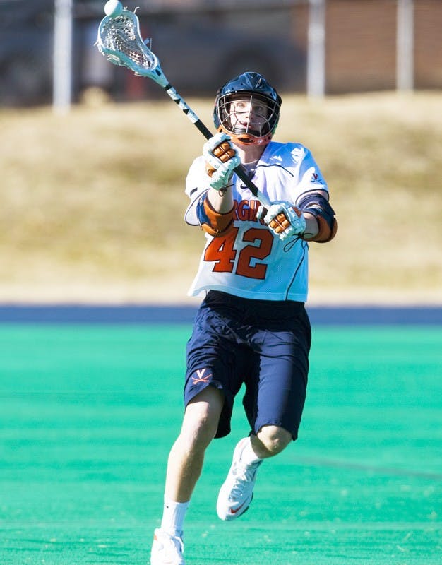Virginia midfielder Max Pomper (42) in action against Navy.  The Virginia Cavaliers scrimmaged the Navy Midshipmen in lacrosse at the University Hall Turf Field  in Charlottesville, VA on February 2, 2008.