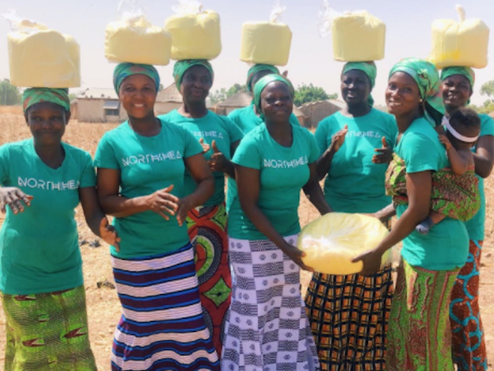 Ghanian women in the village of Woricambo come together to create shea butter from the nuts of the karite tree indigenous to Africa.&nbsp;