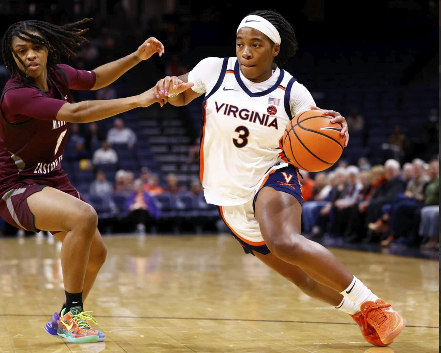 White navigates through the UMES defense.