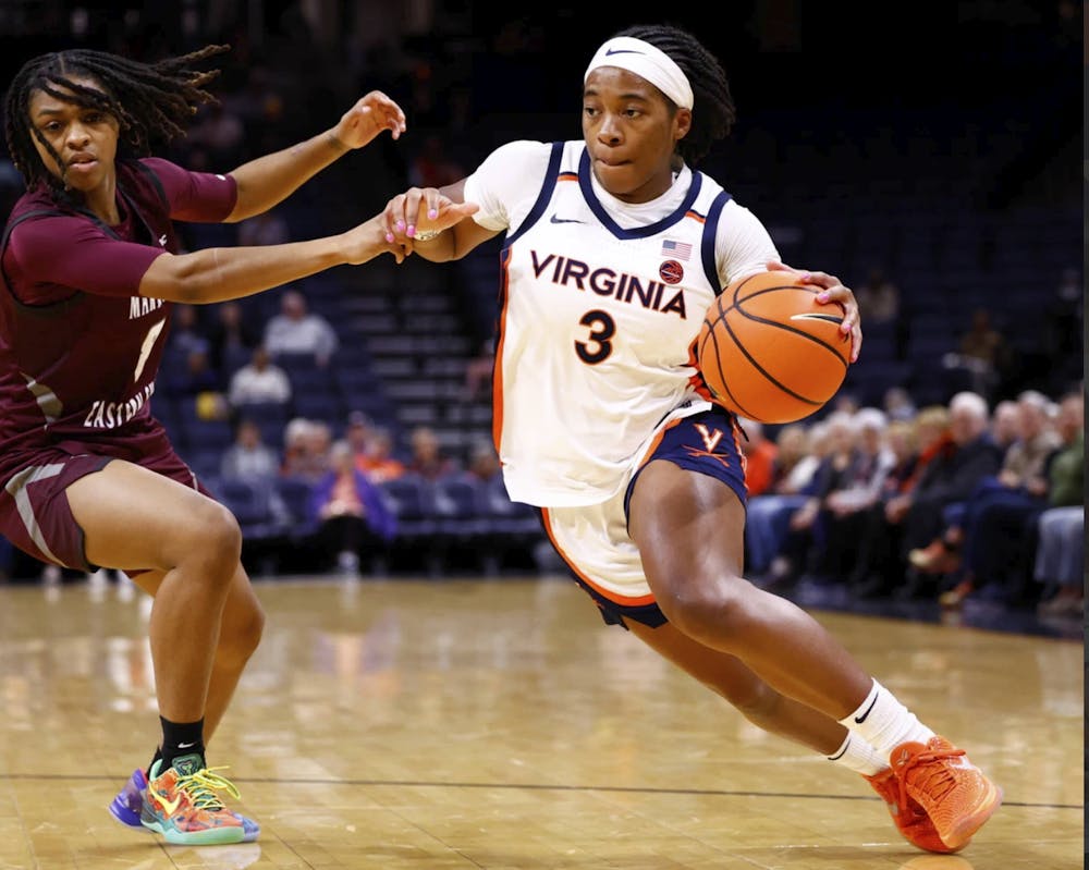 <p>White navigates through the UMES defense.</p>