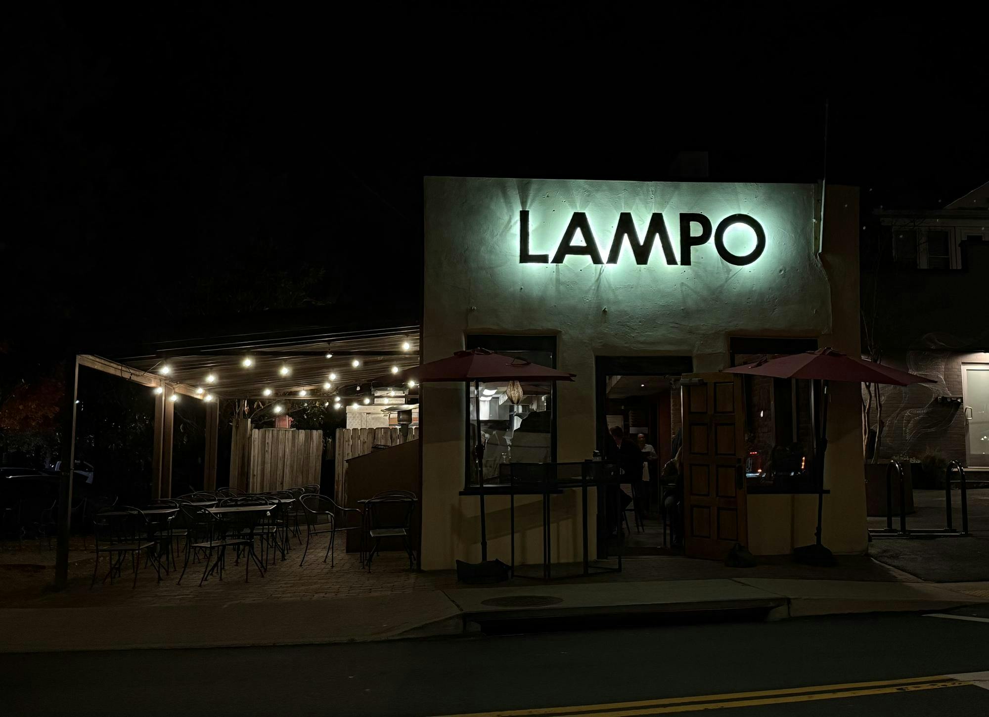 The restaurant, a narrow, pale yellow building with backlit letters, was much smaller than I’d initially perceived from driving by so many times.